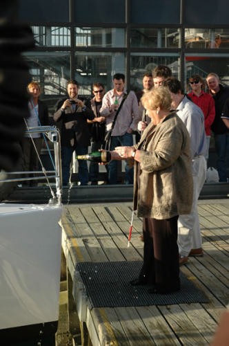 <b>Mrs Mulcare performs the launch honours</b> © www.sailingblind.org.nz